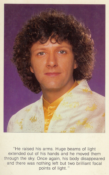 The back cover of The Last Incarnation, showing Rama smiling in front of a purple background and wearing a white and yellow satin Chinese shirt